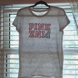 Pink tee, kinder to the planet style. Size S